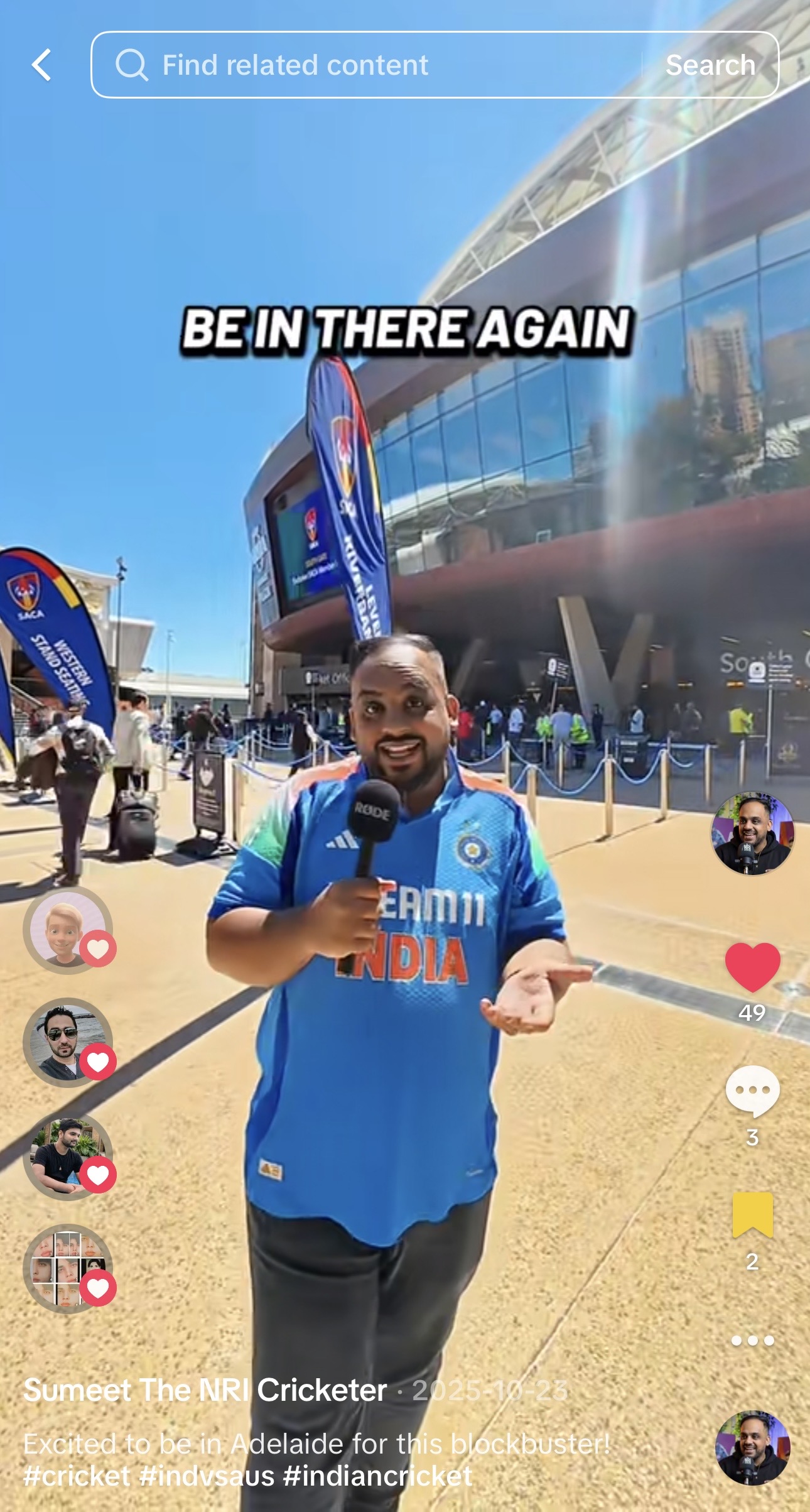 Sumeet Joseph wearing an India cricket shirt and recording with a microphone outside Adelaide Oval